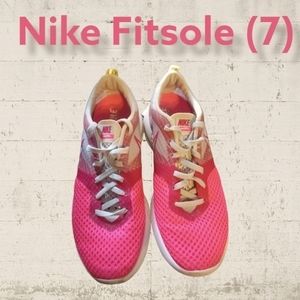 Women's pink and white Nike Fitsole size 7